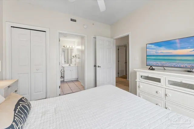 a view of a storage & utility room with dryer and washer