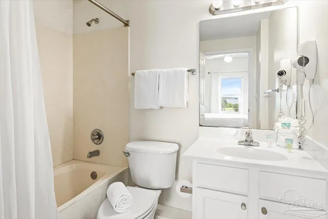 a view of a swimming pool and an outdoor seating