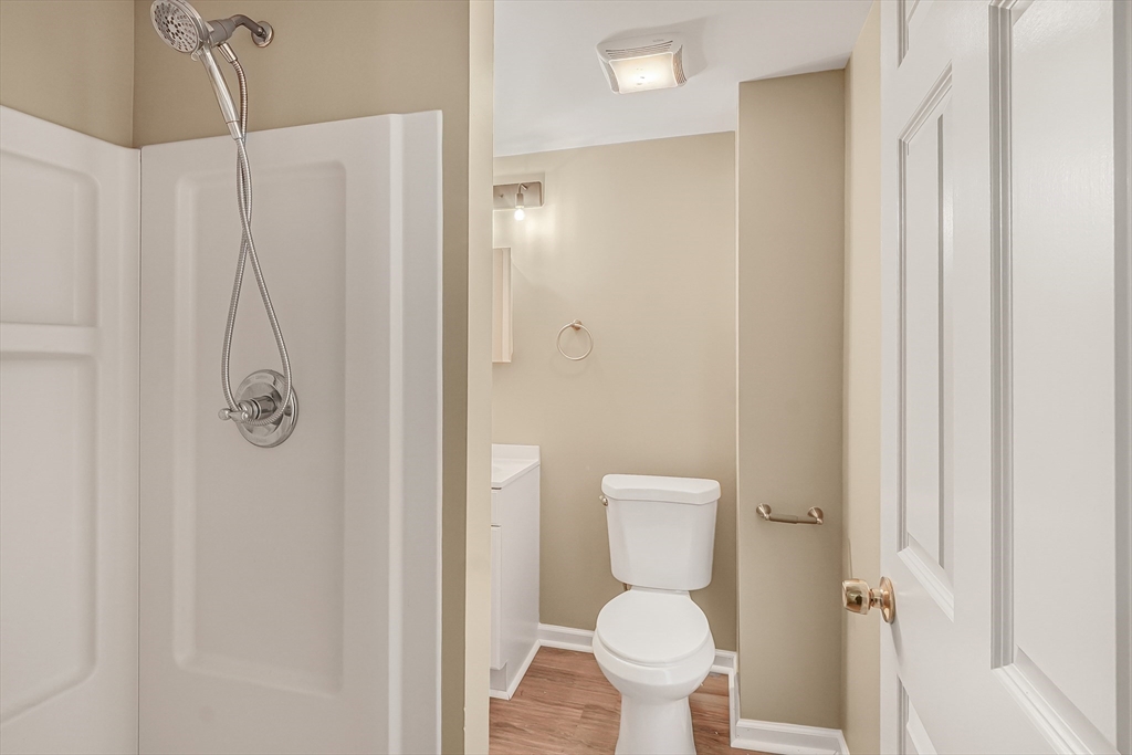 12 Franklin Avenue, Unit 2 Westfield, MA 01085 - Photo 11 of 15 a bathroom with a toilet and a shower