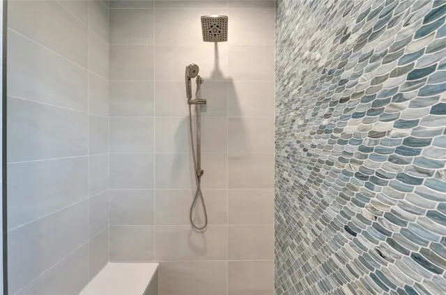 a front view of a house with a yard table and chairs