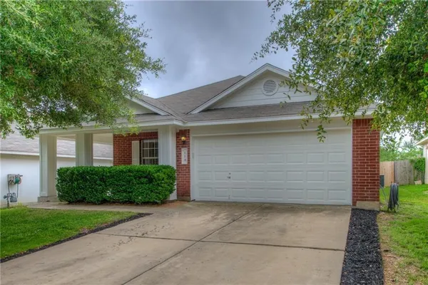 a view of a house with a garage
