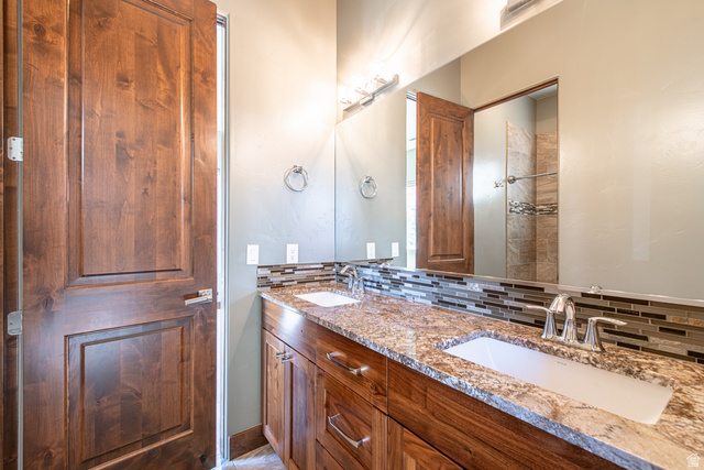 322 340 E Street Ivins, UT 84738 - Photo 40 of 61 Double vanity with granite countertops and two undermount sinks
