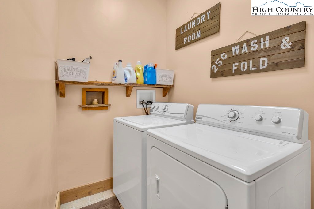 173 Spring Brook Road Newland, NC 28657 - Photo 33 of 39 a utility room with dryer and washer