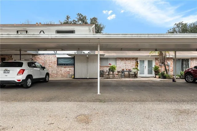 a view of a swimming pool with a yard