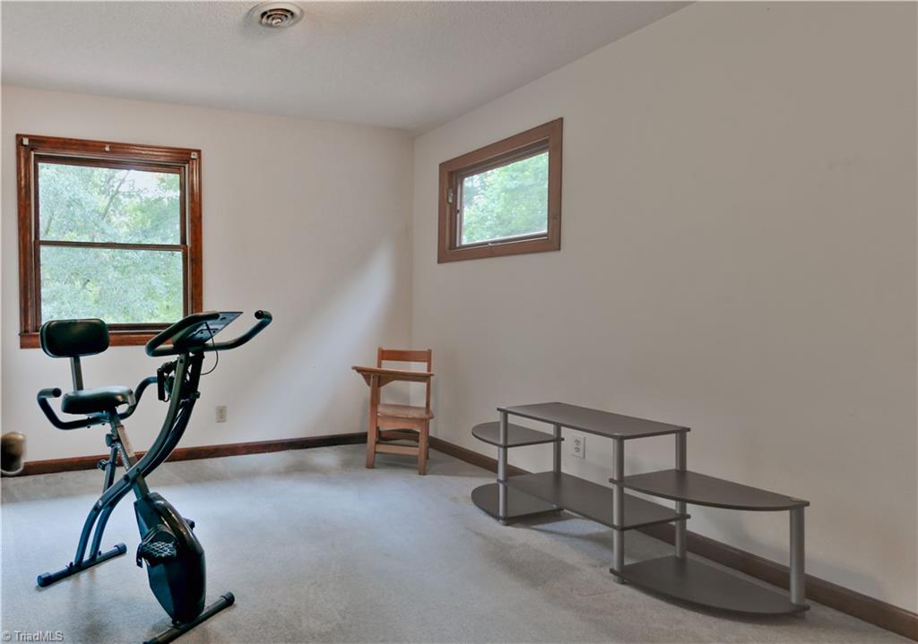 1697 Beasley School Road Sandy Ridge, NC 27046 - Photo 23 of 26 Bedroom