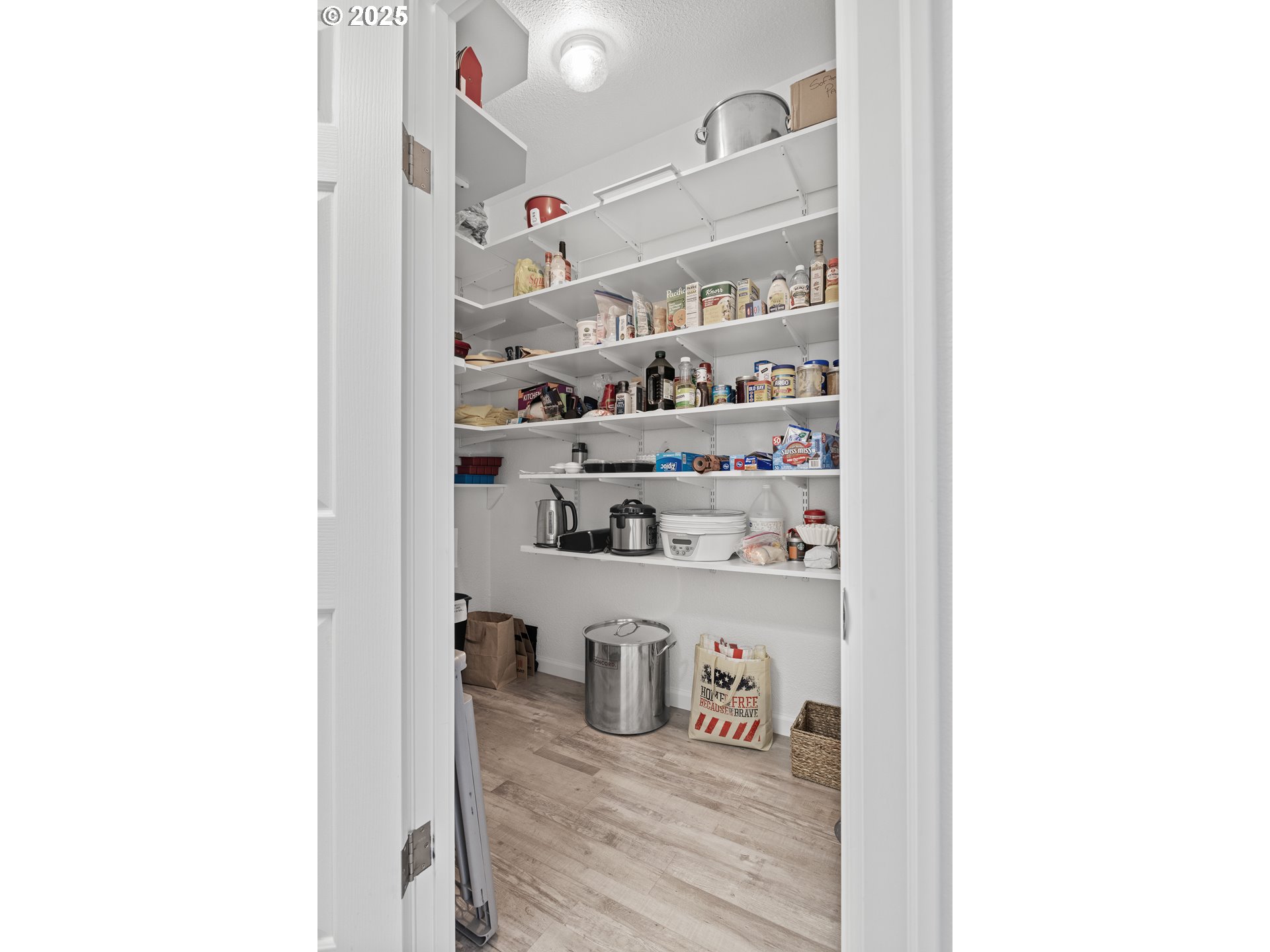 852 Munsel Creek Loop Florence, OR 97439 - Photo 13 of 48 a view of store room with food items