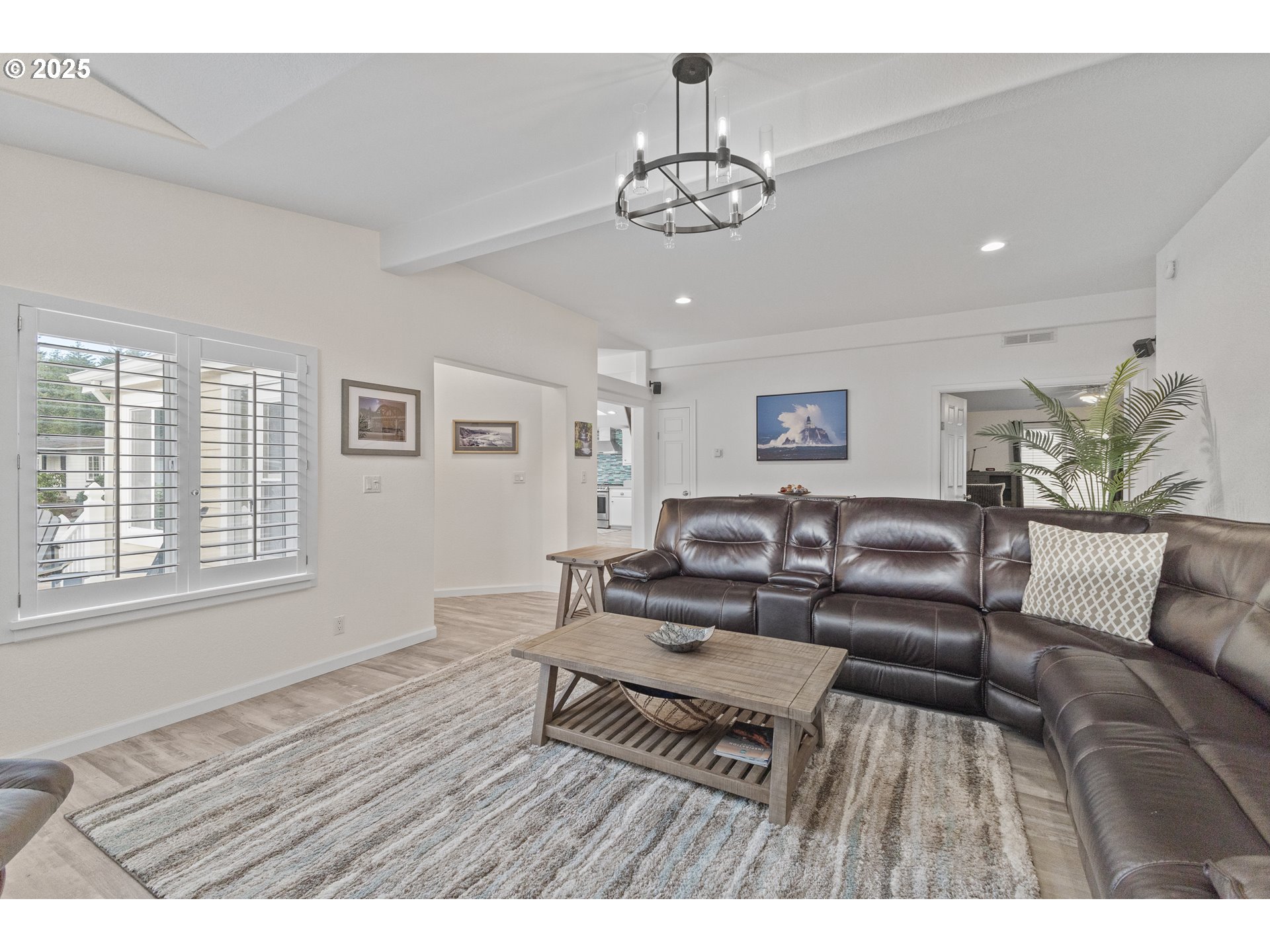 852 Munsel Creek Loop Florence, OR 97439 - Photo 25 of 48 a living room with furniture and a wooden floor