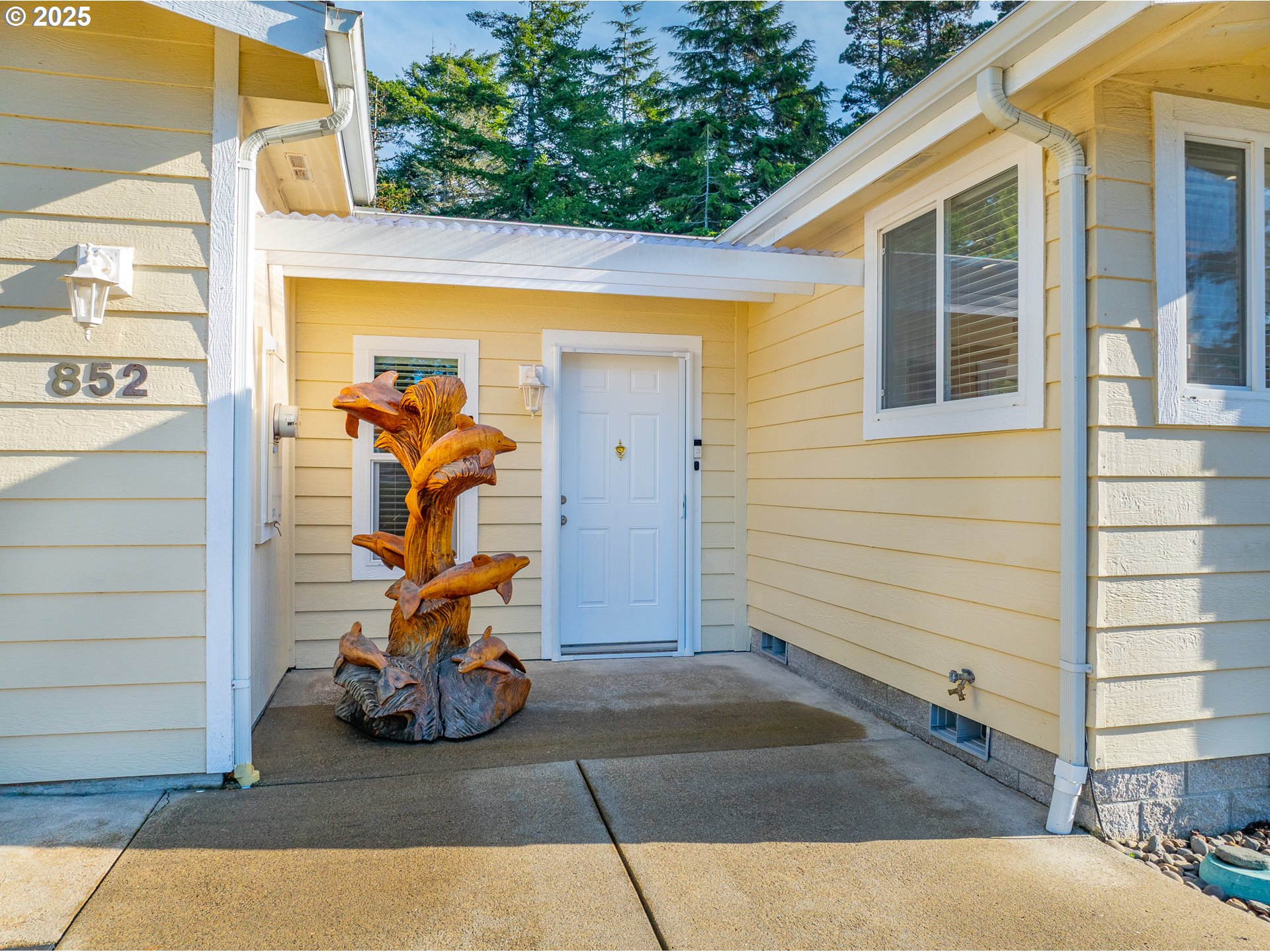 852 Munsel Creek Loop Florence, OR 97439 - Photo 3 of 48 a view of front door and porch