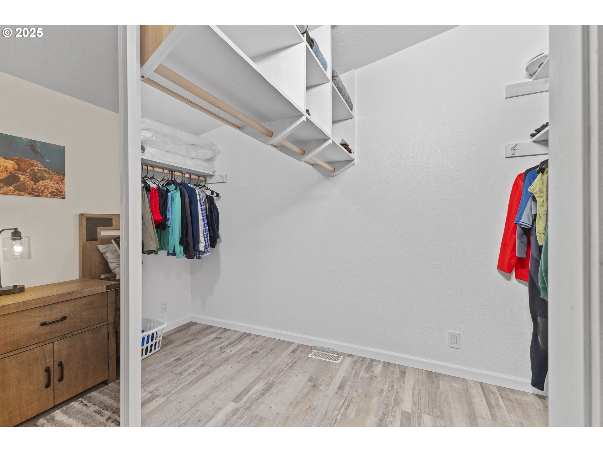 852 Munsel Creek Loop Florence, OR 97439 - Photo 36 of 48 a view of a storage & utility room with wooden floor