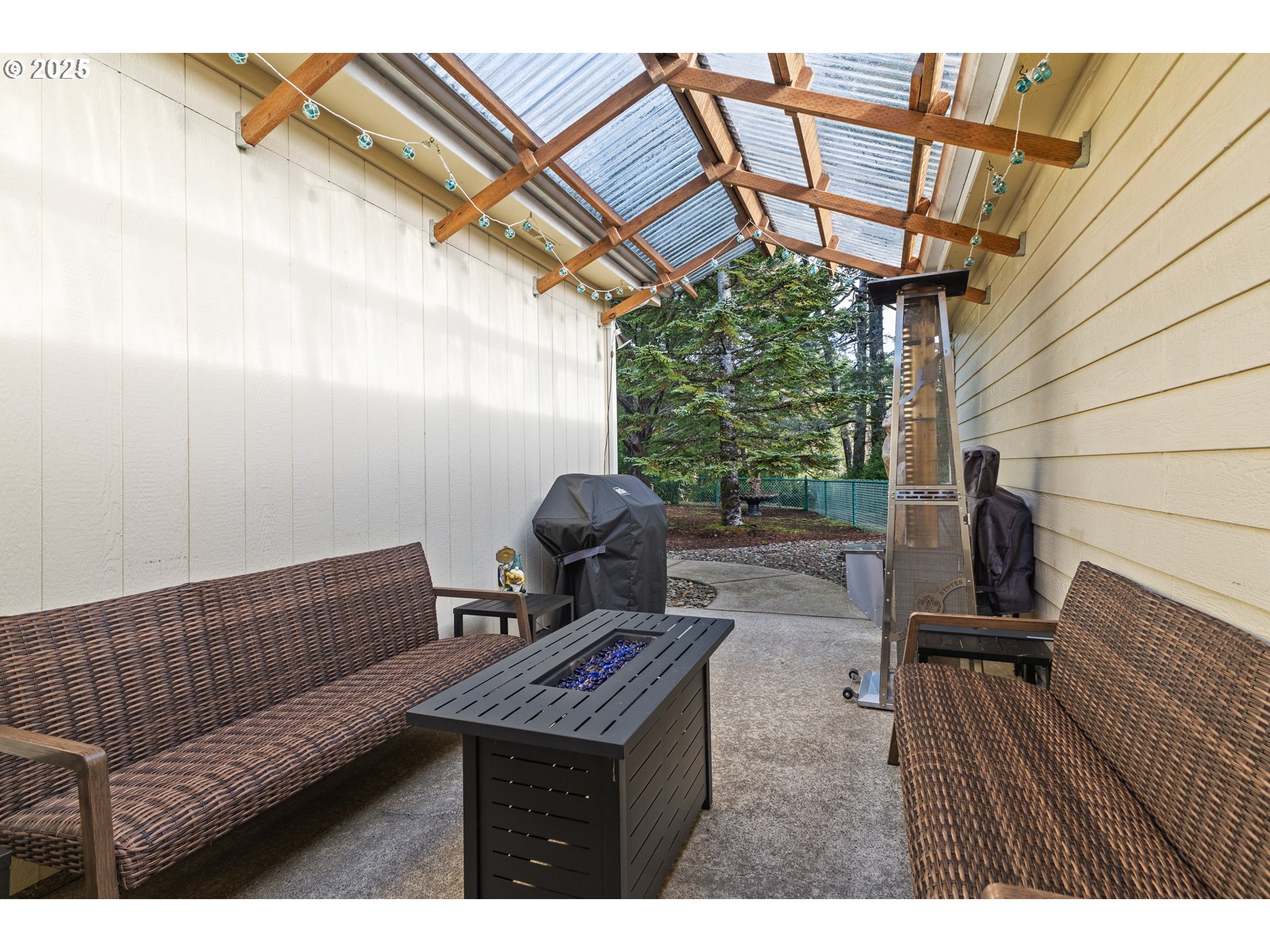 852 Munsel Creek Loop Florence, OR 97439 - Photo 40 of 48 a view of outdoor space with seating area