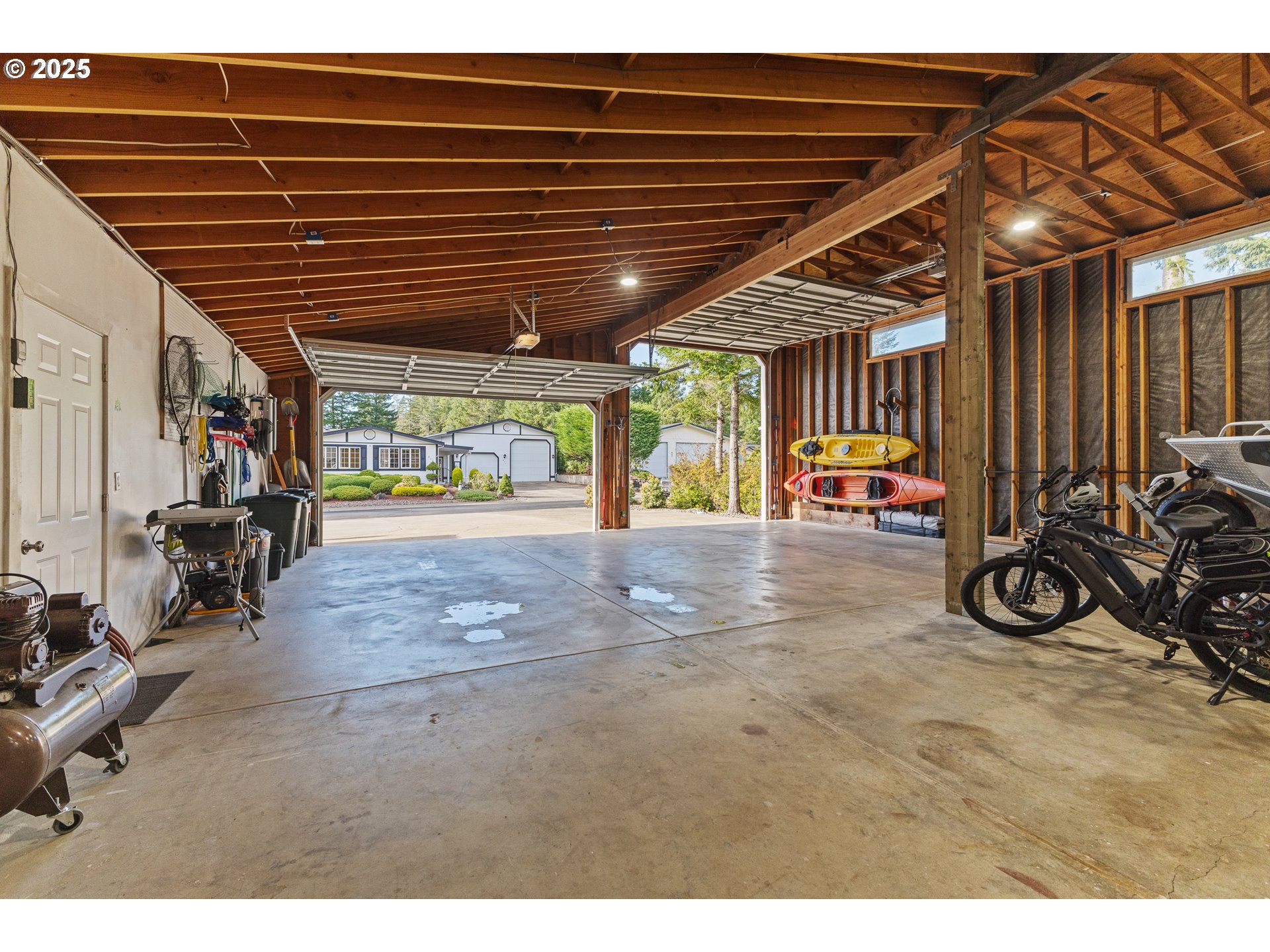 852 Munsel Creek Loop Florence, OR 97439 - Photo 47 of 48 a view of car garage