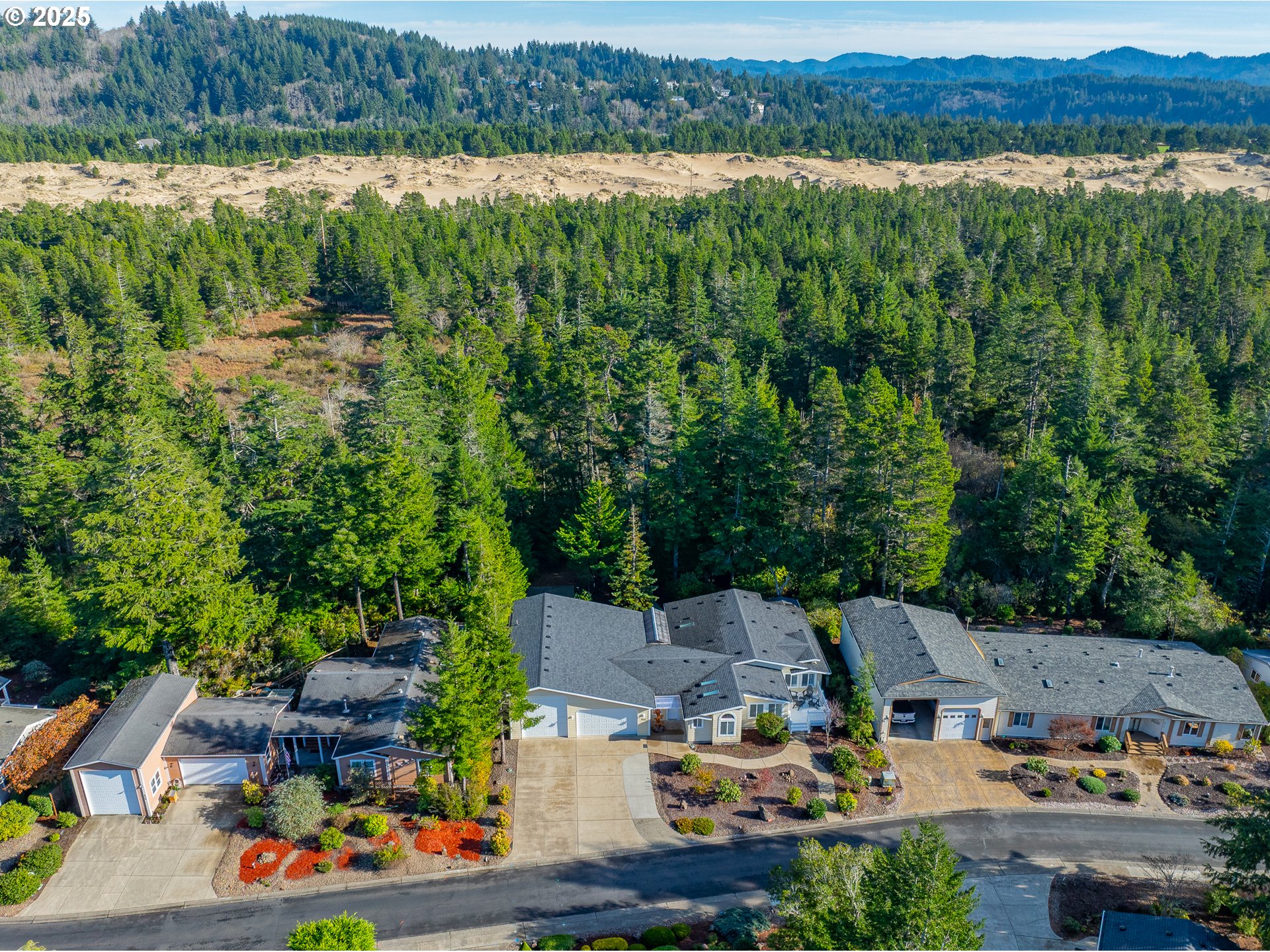 852 Munsel Creek Loop Florence, OR 97439 - Photo 6 of 48 an aerial view of multiple house