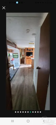 a upper view of a floor to ceiling window and chairs