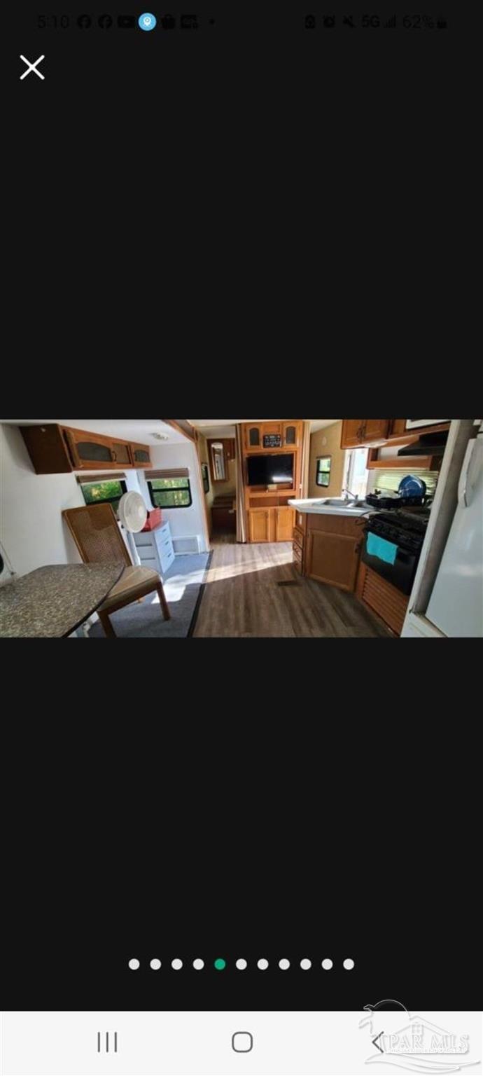 612 Rentz Avenue Pensacola, FL 32507 - Photo 17 of 18 a upper view of a floor to ceiling window and chairs