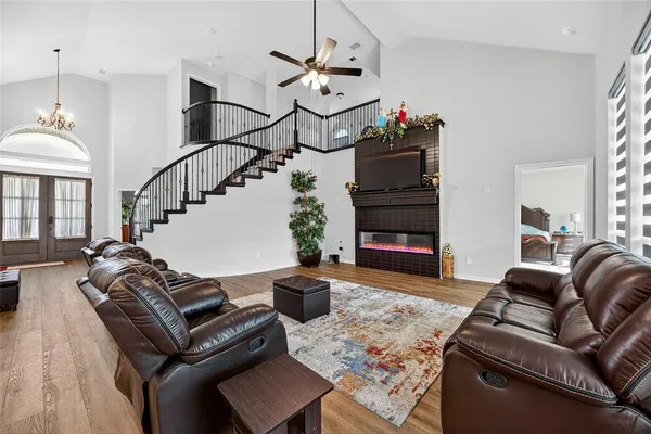 a living room with furniture or couch and a fireplace