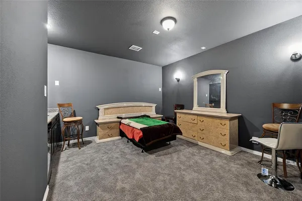 a room with furniture and a wooden table