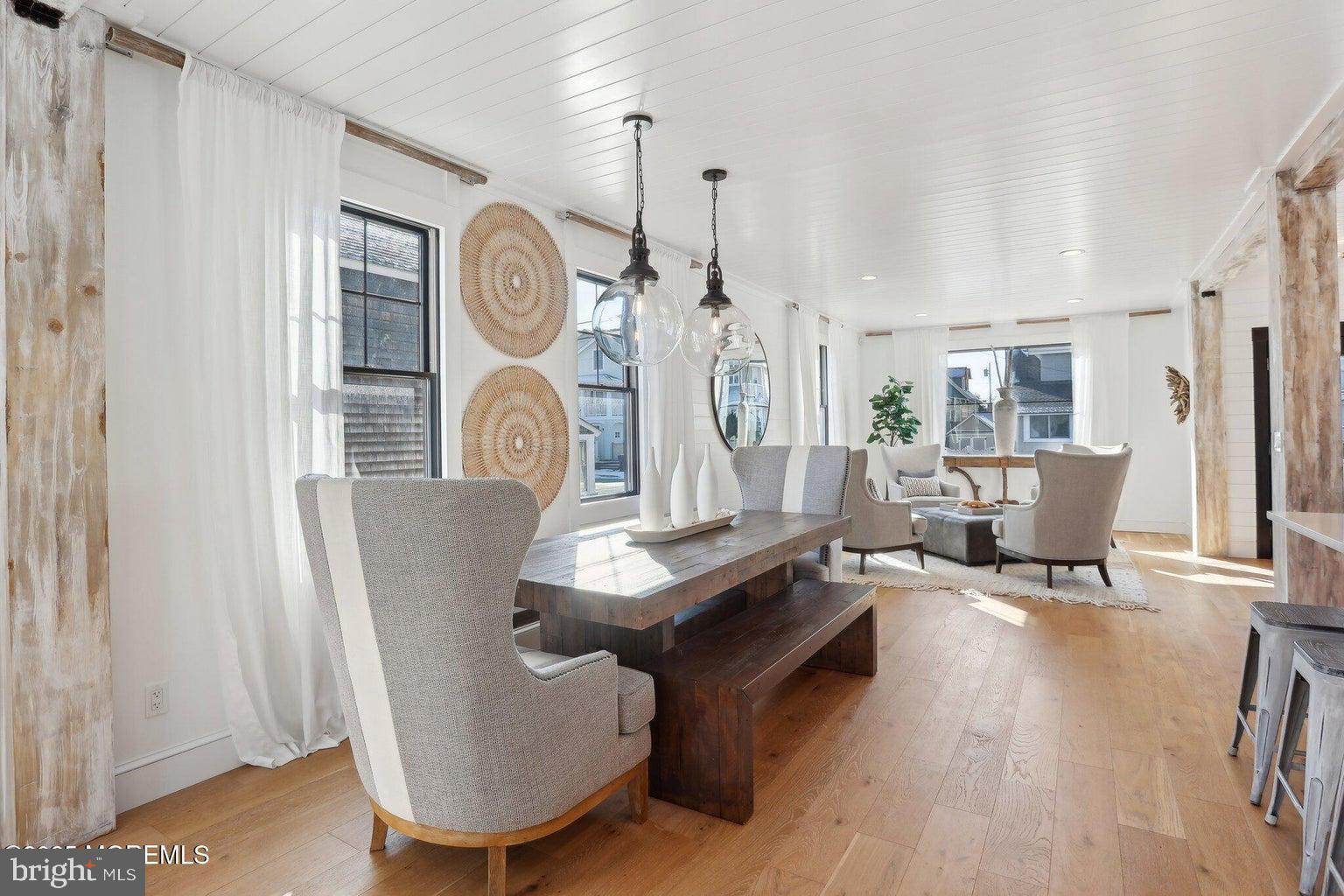 211 4th Street Beach Haven, NJ 08008 - Photo 16 of 48 a living room with furniture a rug and white walls