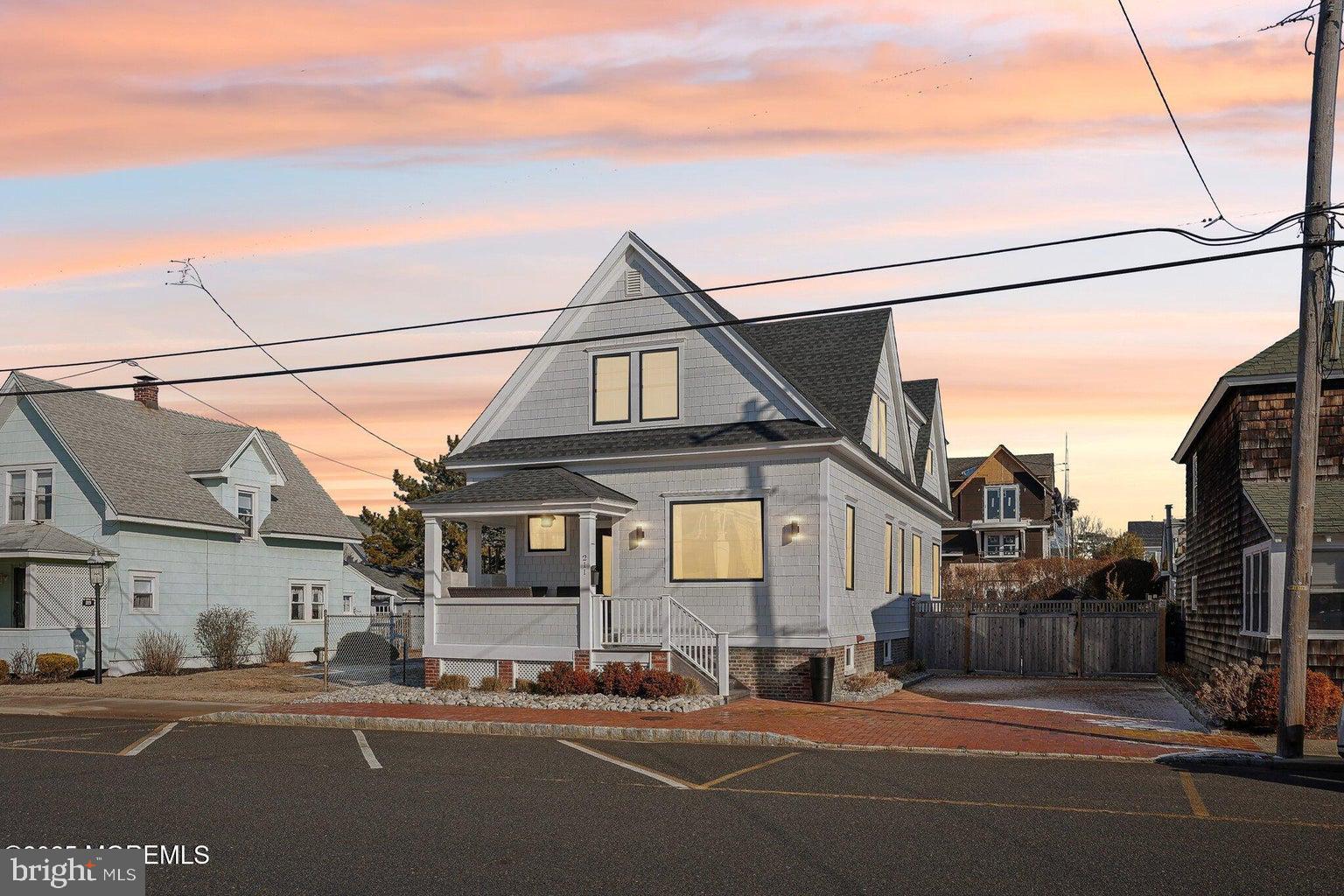 211 4th Street Beach Haven, NJ 08008 - Photo 2 of 48 a parked cars parked in front of a house