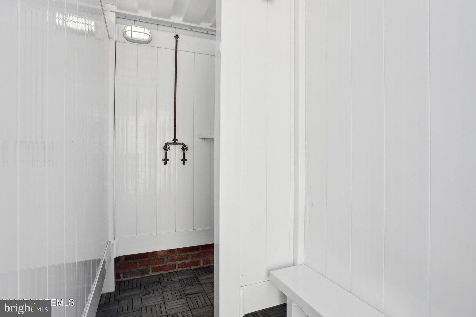 211 4th Street Beach Haven, NJ 08008 - Photo 43 of 48 a bathroom with a shower