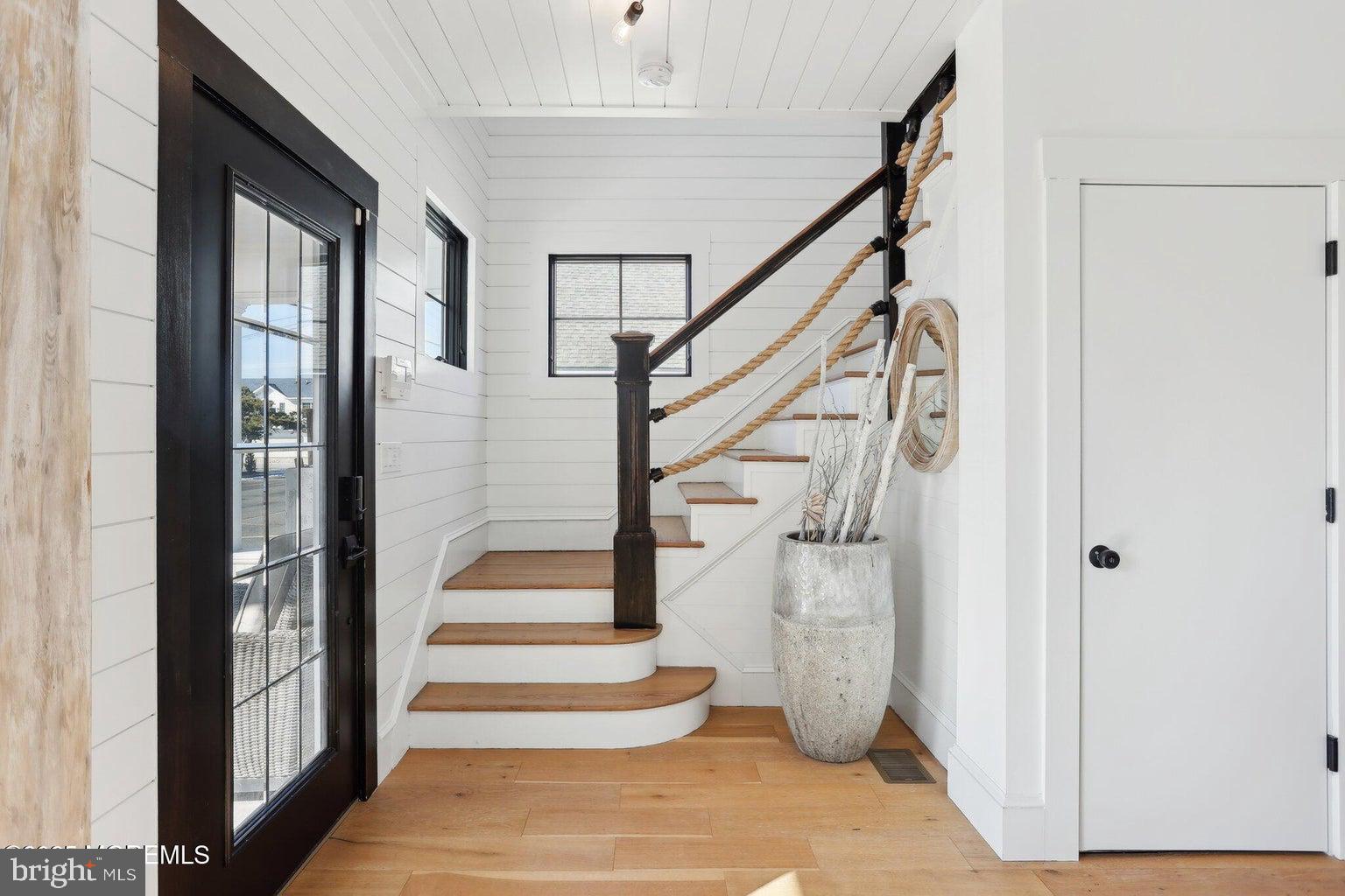 211 4th Street Beach Haven, NJ 08008 - Photo 5 of 48 a view of entryway with wooden floor and windows