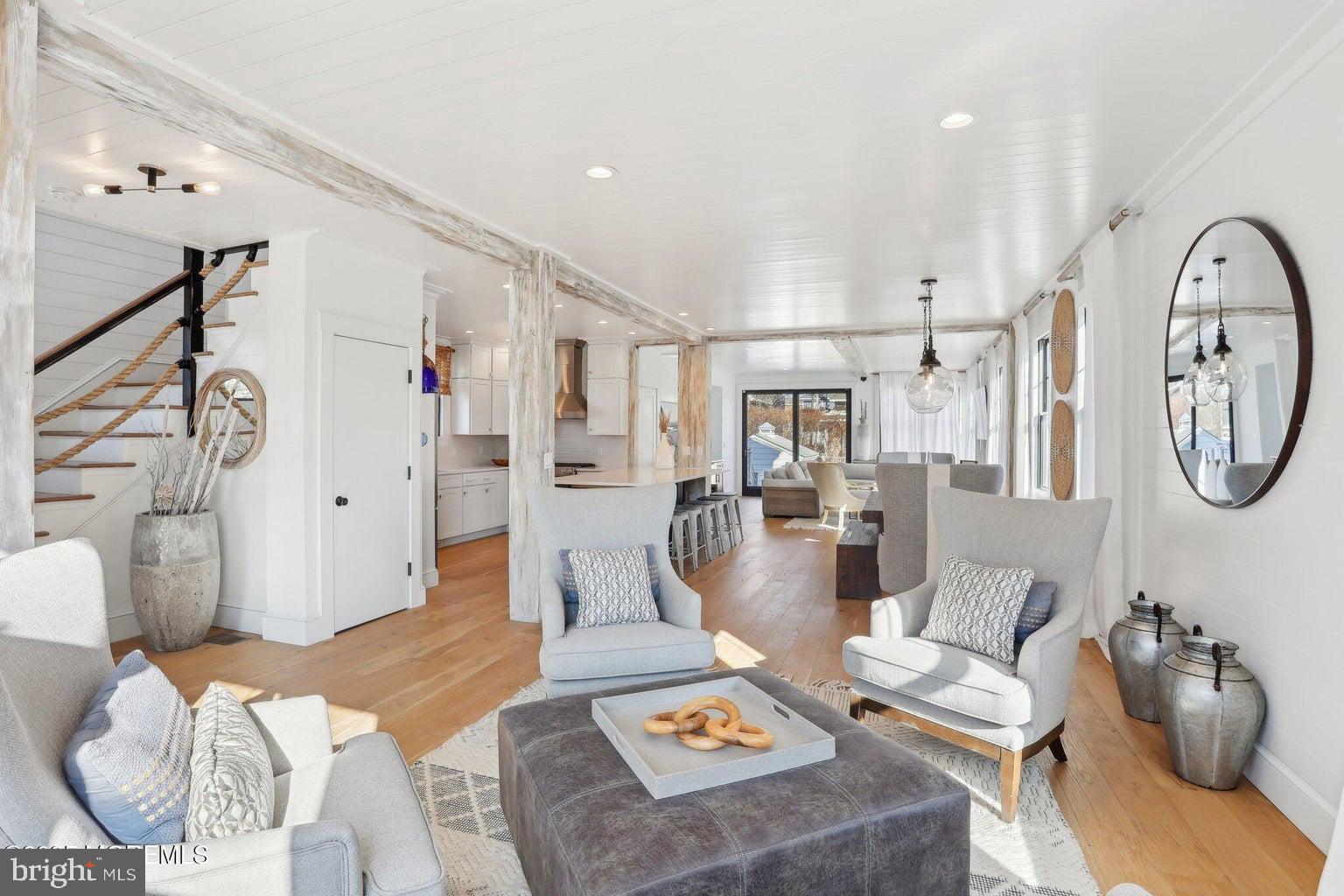 211 4th Street Beach Haven, NJ 08008 - Photo 7 of 48 a living room with furniture and a large window