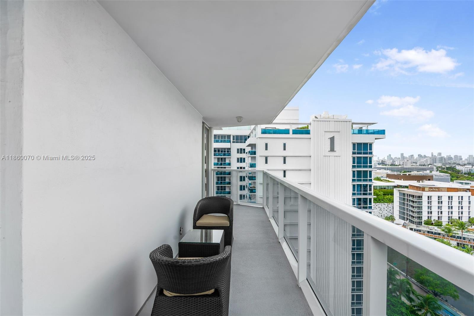 2401 Collins Avenue, Unit 1808 Miami Beach, FL 33140 - Photo 36 of 62 a view of balcony with furniture