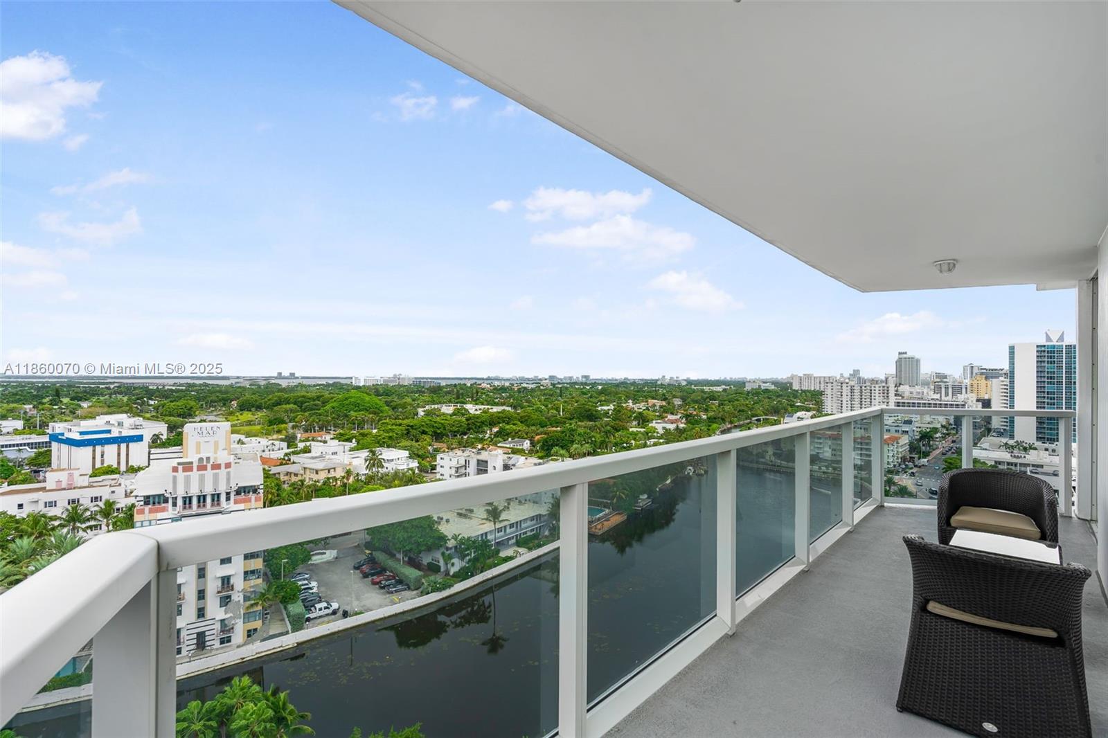 2401 Collins Avenue, Unit 1808 Miami Beach, FL 33140 - Photo 37 of 62 a view of a city skyline from a balcony