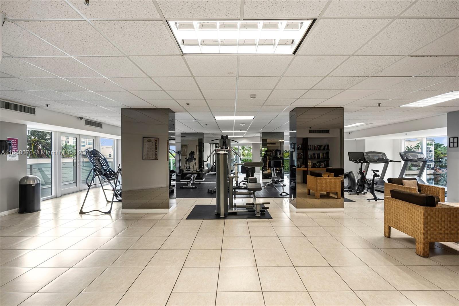2401 Collins Avenue, Unit 1808 Miami Beach, FL 33140 - Photo 46 of 62 a view of a room with lots of tables and chairs
