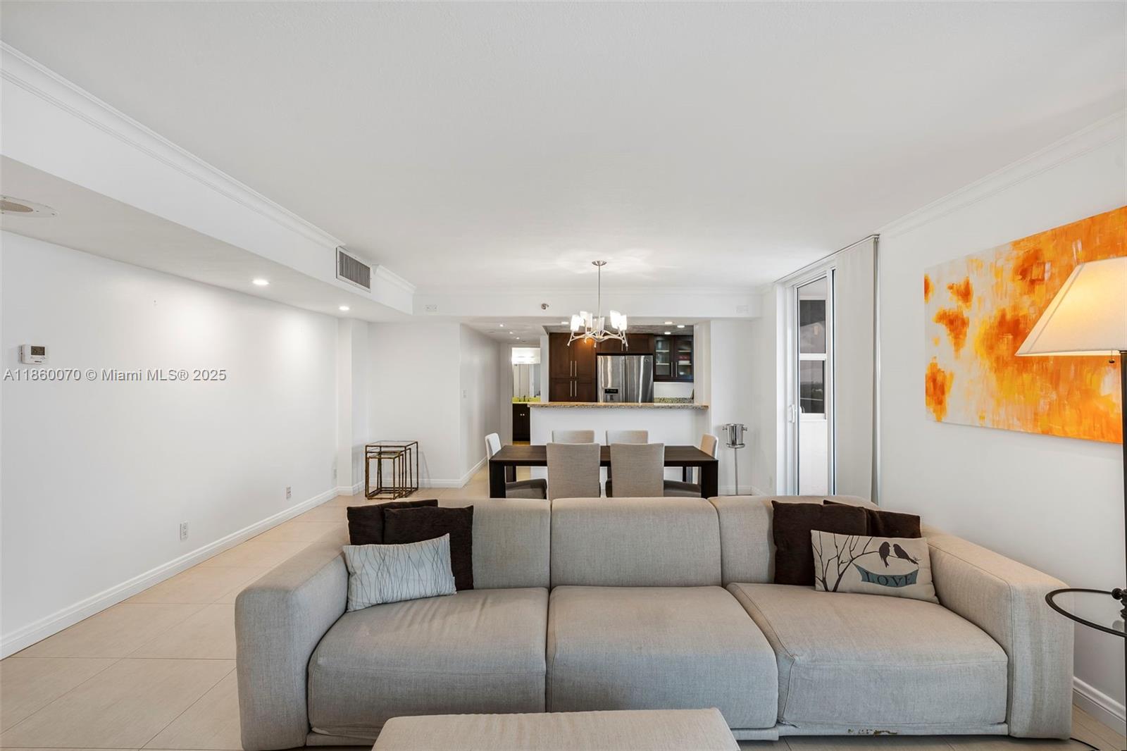 2401 Collins Avenue, Unit 1808 Miami Beach, FL 33140 - Photo 9 of 62 a living room with furniture and a couch