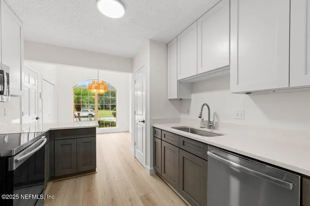 a view of swimming pool with seating space