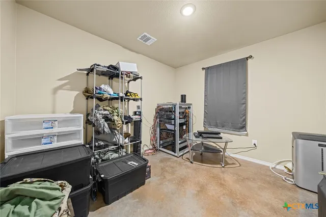 a view of a workspace with furniture