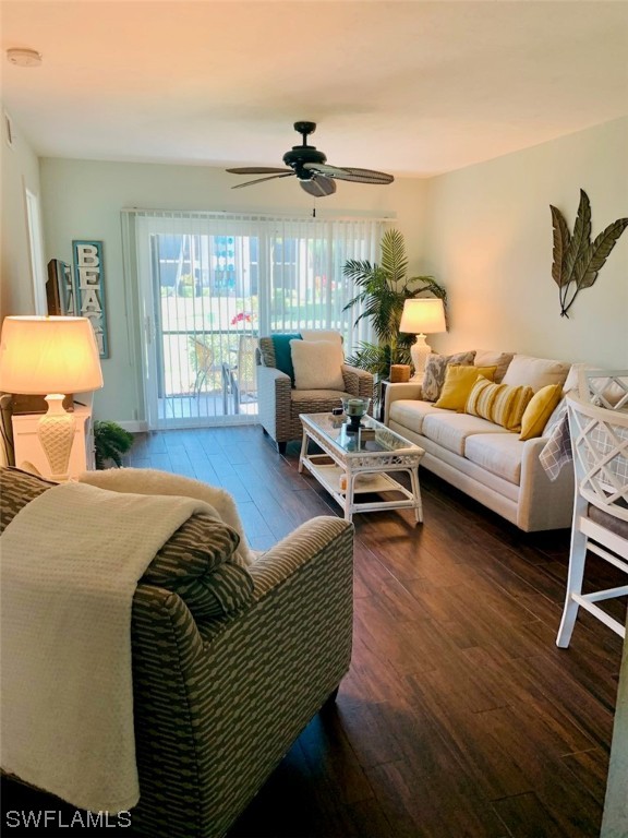 16881 Davis Road, Unit 216 Fort Myers, FL 33908 - Photo 11 of 26 a living room with furniture and a window