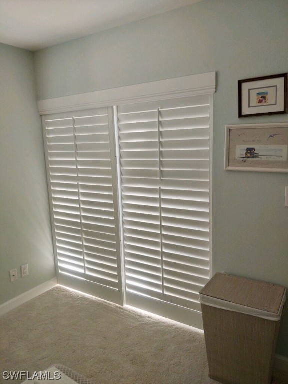16881 Davis Road, Unit 216 Fort Myers, FL 33908 - Photo 14 of 26 a view of a room that has a window and a door