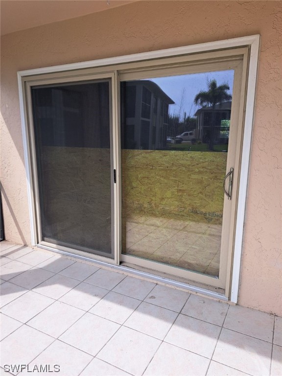 16881 Davis Road, Unit 216 Fort Myers, FL 33908 - Photo 19 of 26 a view of entryway with a door