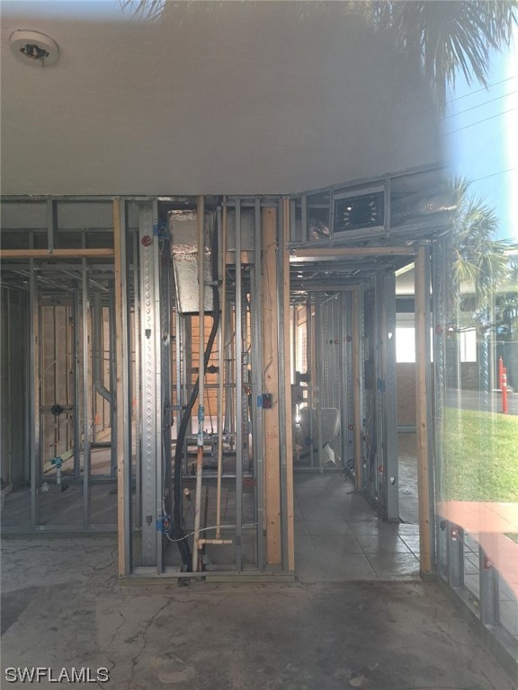 16881 Davis Road, Unit 216 Fort Myers, FL 33908 - Photo 23 of 26 a view of gallery with windows