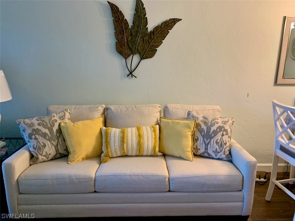 16881 Davis Road, Unit 216 Fort Myers, FL 33908 - Photo 7 of 26 a living room with a couch