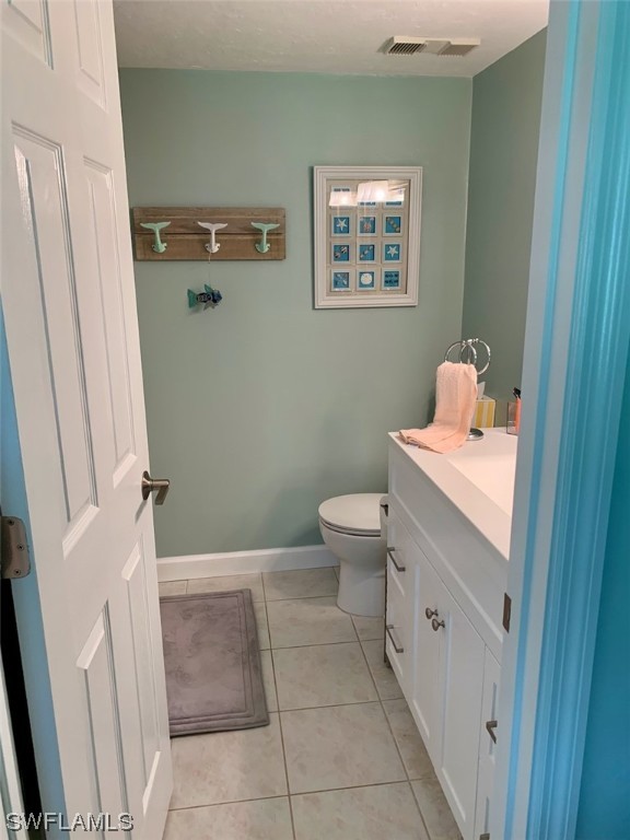 16881 Davis Road, Unit 216 Fort Myers, FL 33908 - Photo 10 of 26 a bathroom with a sink a toilet and shower