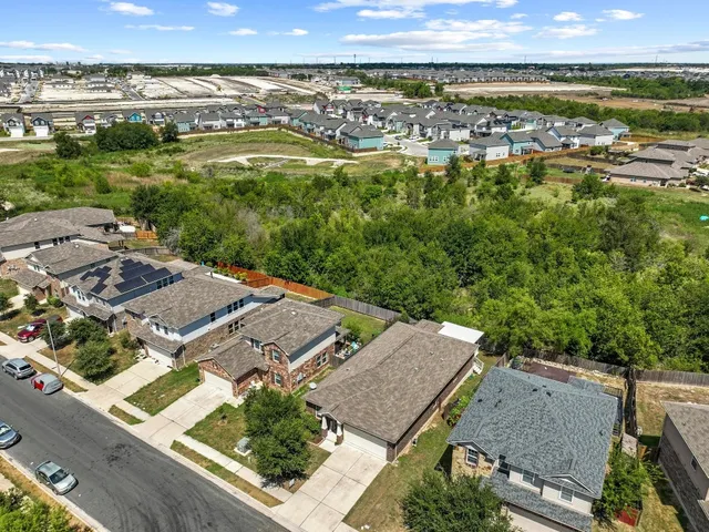 an aerial view of a building with outdoor space