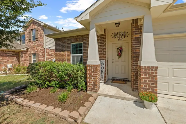 a front view of a house with a shower
