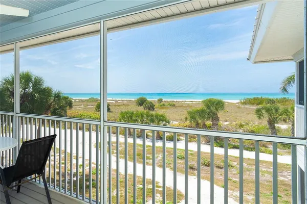 a view of a porch with a chair