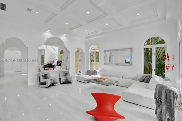 a bedroom with a bed and cabinets