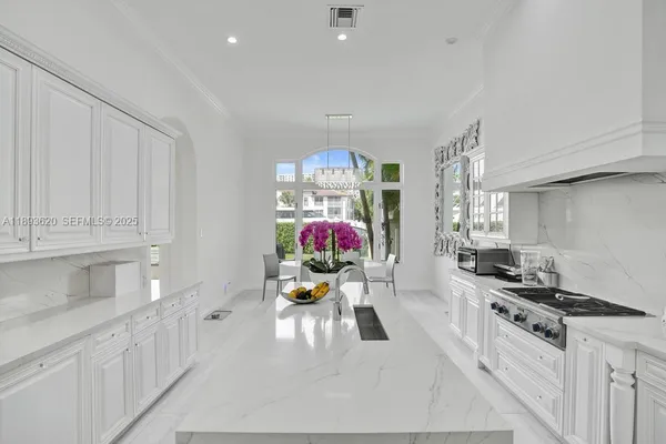 a bathroom with a toilet a sink and a mirror