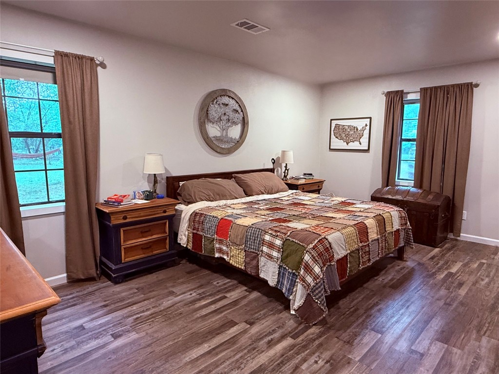 25 Ridge Top Drive Huntsville, TX 77320 - Photo 14 of 19 a bedroom with a bed and a window