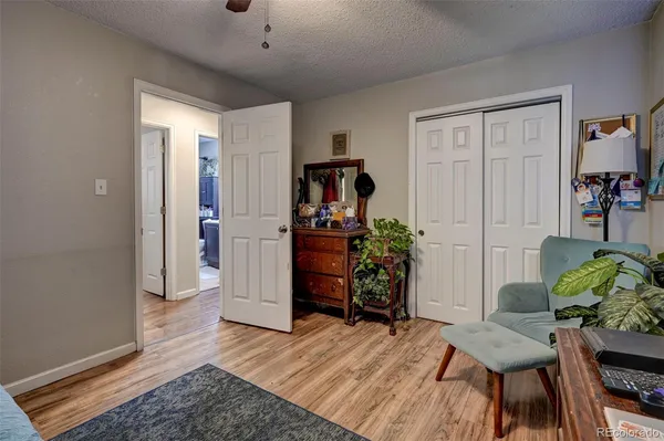 a room with furniture and a closet