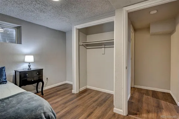 a view of a livingroom with furniture and wooden floor