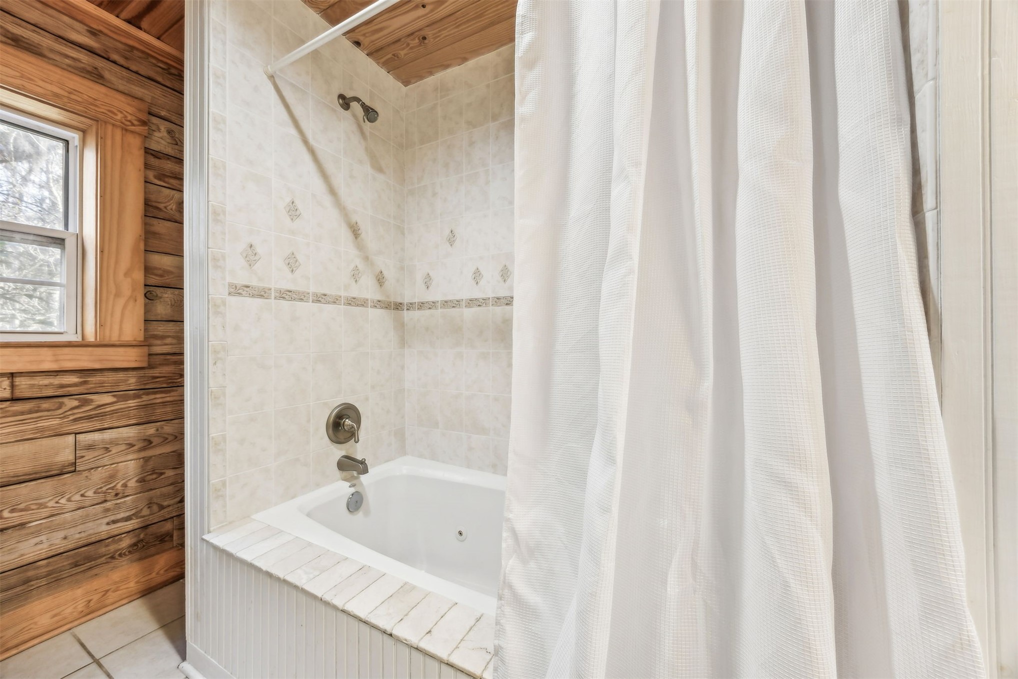 86205 Pages Dairy Road Yulee, FL 32097 - Photo 23 of 56 a bathroom with a bathtub and a shower