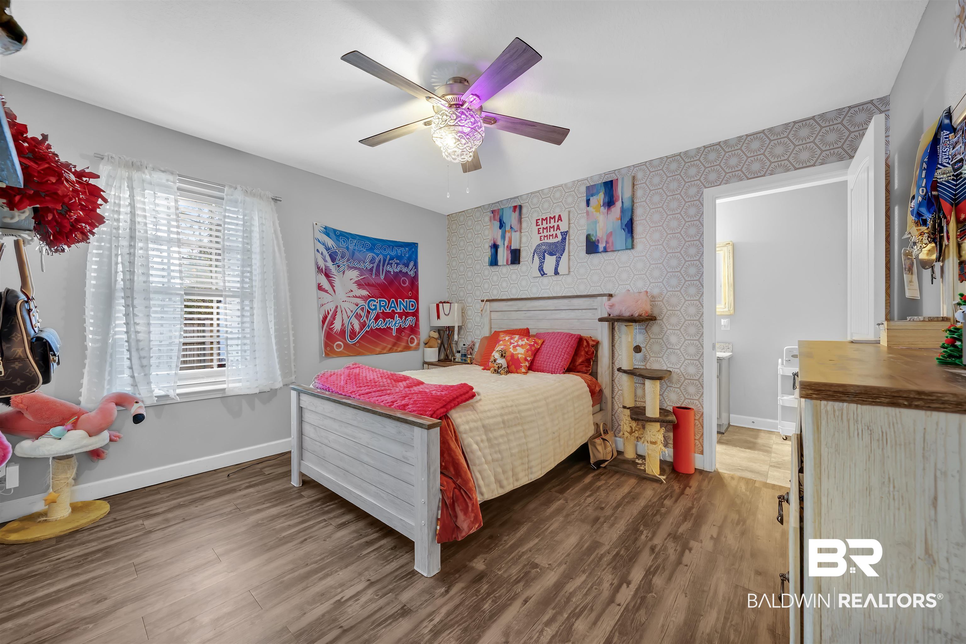 10180 Lyttleton Loop Lillian, AL 36549 - Photo 22 of 37 Bedroom with an accent wall, dark wood-style flooring, ceiling fan, and wallpapered walls