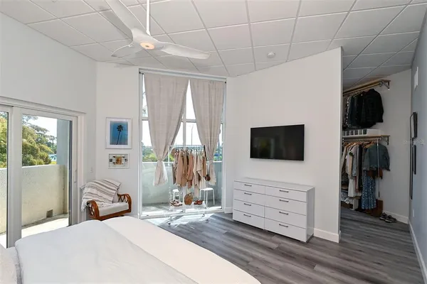 a view of an empty room and a window