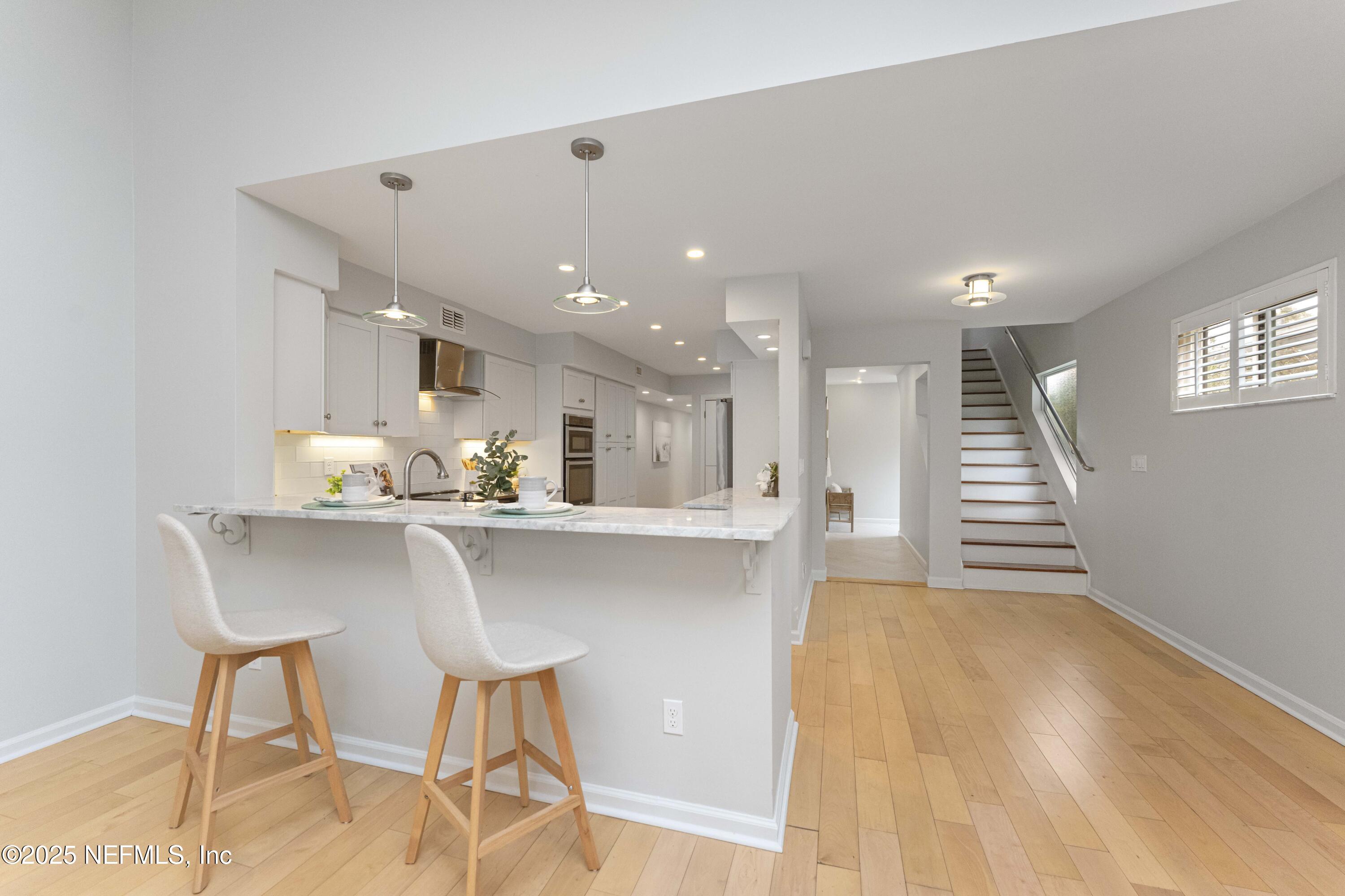 372 4th Street Atlantic Beach, FL 32233 - Photo 11 of 77 Warm Wood Floors