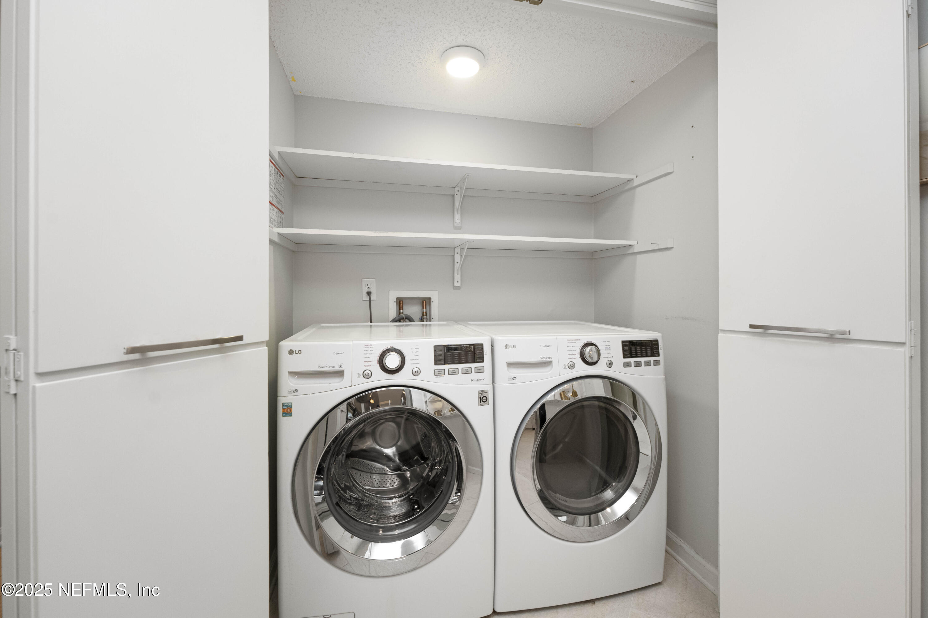 372 4th Street Atlantic Beach, FL 32233 - Photo 16 of 77 a utility room with dryer and washer
